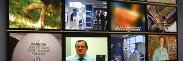 Photo of eight TV screens in a grid