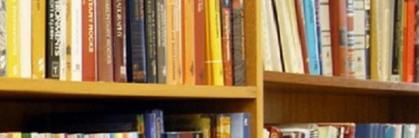 Library shelves with books