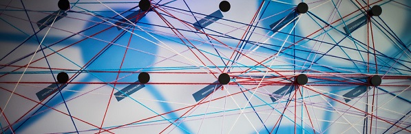 Red and blue string connecting points on a board