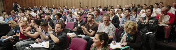 View of the audience seated in a lecture theatre