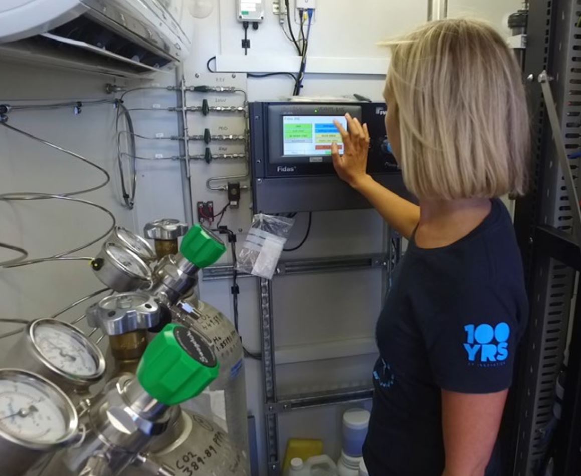 A person looking at a computer