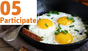 Fried eggs cooking in a frypan