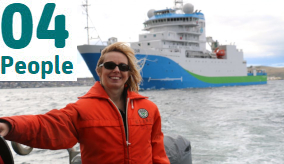 Toni Moate standing in front of the RV Investigator