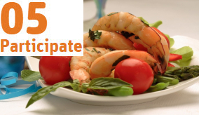 cooked prawns on a plate with salad