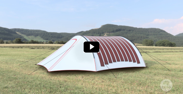 still image from a video showing a tent in a field with printed solar panels on it