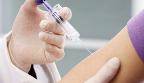 close up of person getting a vaccine injection