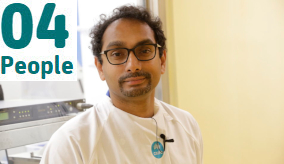 professor s.s vasan in a lab coat smiling at the camera