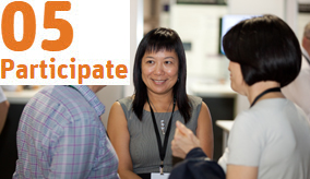 Three people having a discussion