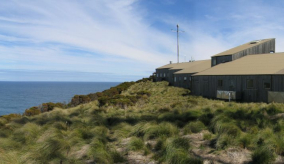 cape grim greenhouse gas measuring station in Tasmania with ocean in the background