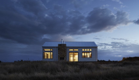 a house at night with lights on