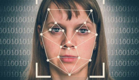 Woman with facial mapping technology edited over face.